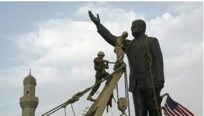 صدام وقف ببغداد وراقب بأم عينيه تمثاله يسقط.. شاهد يؤكد