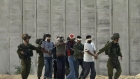 الجيش الإسرائيلي يواصل اجتياح غزة.. ويطلق سراح 76 أسيراً فلسطينياً
