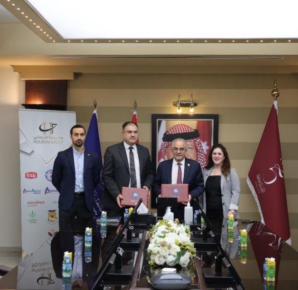 عمان الأهلية تُوقّع اتفاقيتين بحثيتين